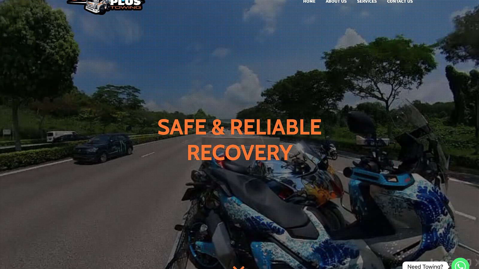 Orange Plus Towing website hero showing a motorcycle recovery scene with 'Safe & Reliable Recovery' headline.
